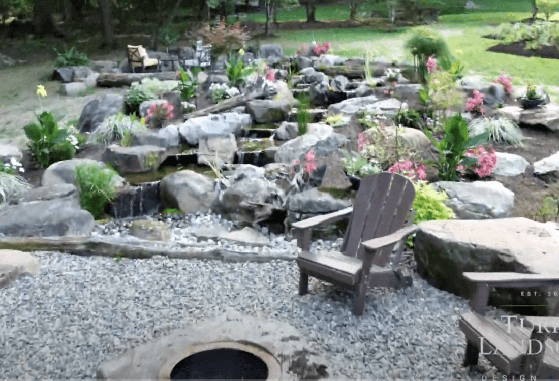 Pond and boulder fire pit